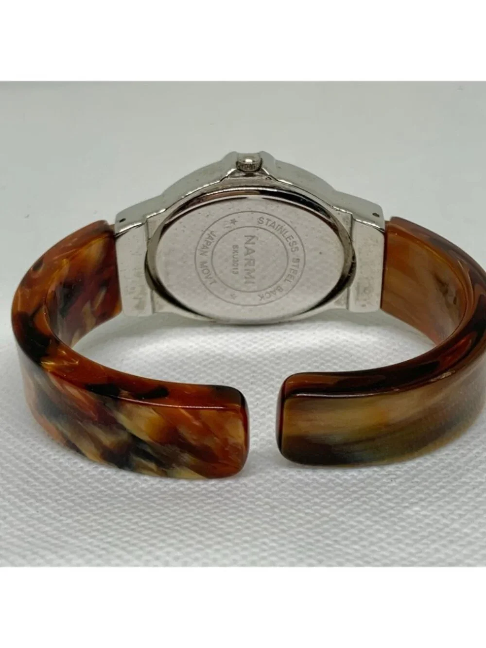 Narmi women’s watch tortoiseshell silver tone quartz cuff band 29mm 6” running